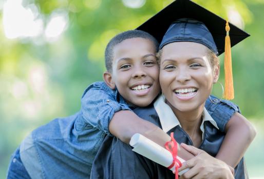 Black woman graduate and son