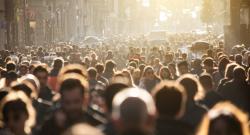 Crowd in the street with golden sunlight