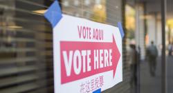Vote Aqui Vote Here bilingual signage