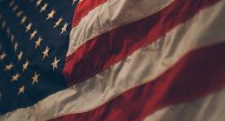 Close up of American flag in dim light
