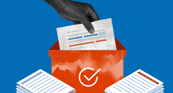 Image of a hand lowering a voter registration sheet into an orange box with stacks of voter registration papers on both sides