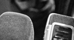 Black and white photo of microphones
