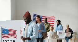 Voters of color at the voting booths