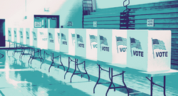 Row of  empty voting booths in a school gym