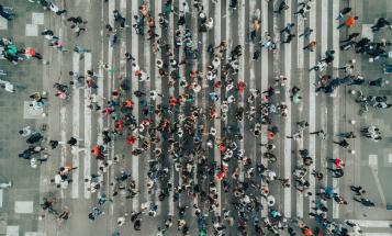 Crowded crosswalk viewed from above