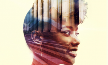 Woman smiling, looking to the left