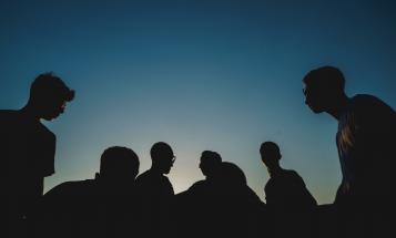 People in silhouette