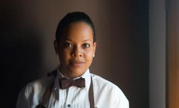 Smiling black waitress