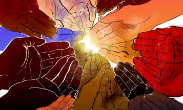 A circle of multi-racial hands extended and reaching for the light