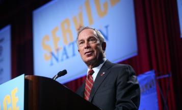 Michael Bloomberg speaking at podium (Creative Commons credit: Be the Change Inc)