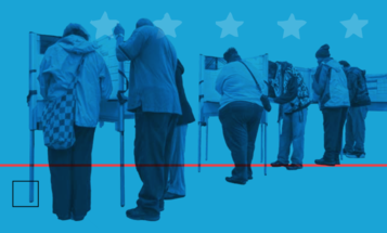 People standing at voting booths