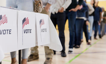 Line of people waiting to vote