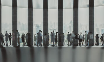 Defocused business people in the office lobby