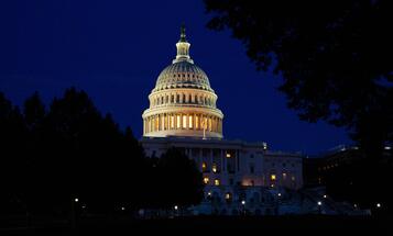 The US Capitol Building at night