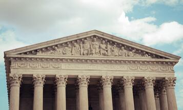 View of the top of the Supreme Court building at a distance