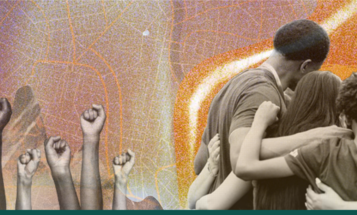 Fists in the air beside a group of people huddled in a circle with arms around each other
