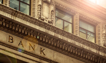 Image of exterior of bank building with the work "Bank" enscribed on the building