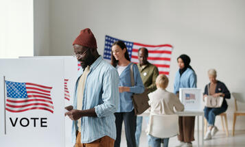 Voters of color at the voting booths