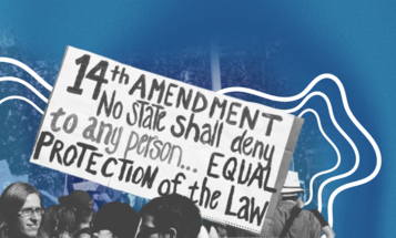 Protestors carrying a sign with the 14th Amendment on it