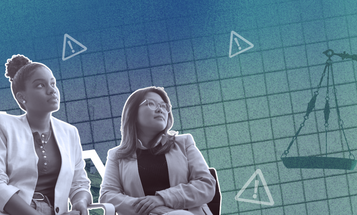 Three professionals engaged in a discussion with the scales of justice in the background