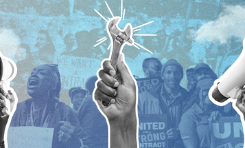 Symbols of organizing and activism in front of a group of people holding signs