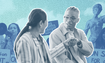 Two individuals shaking hands 