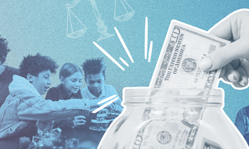 A hand dropping cash into a jar