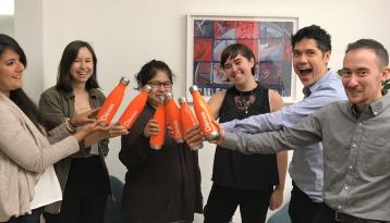 Group with Demos water bottles