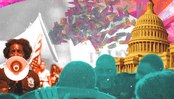 Woman with megaphone in front of a crowd of people in front the Capitol Building