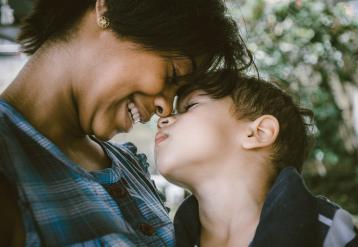 Woman and son sharing a close moment