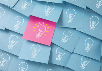 Light bulb drawing on sticky notes