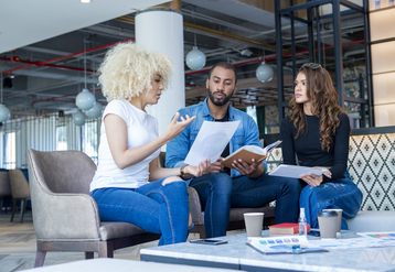 Group of people working together at a table