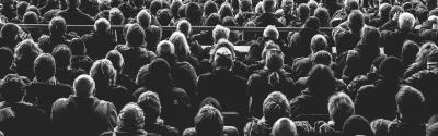 Backs of seated people