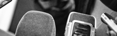 Black and white photo of microphones