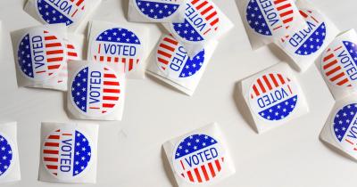 "I Voted" stickers on desk