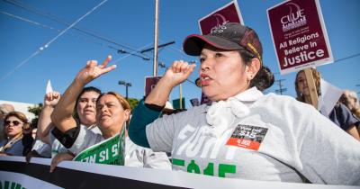 Latina Fight for $15 protestors at rally