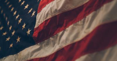 Close up of American flag in dim light