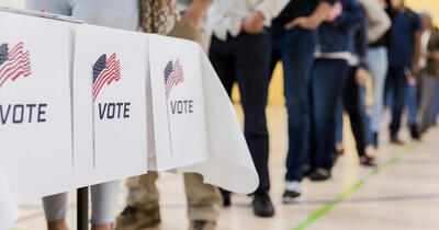 Line of people waiting to vote