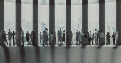 Defocused business people in the office lobby