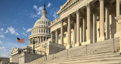 Detail view of the US Capitol east facade in the early morning sun.