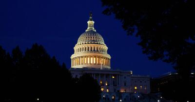 The US Capitol Building at night