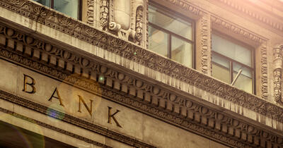 Image of exterior of bank building with the work "Bank" enscribed on the building