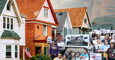 A Whole Home Repairs campaign in front of a row of houses