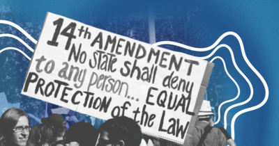 Protestors carrying a sign with the 14th Amendment on it