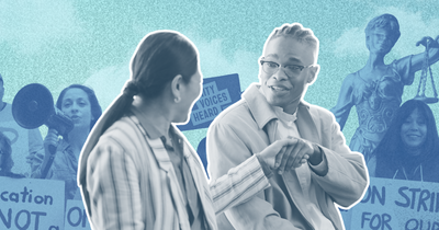 Two individuals shaking hands 