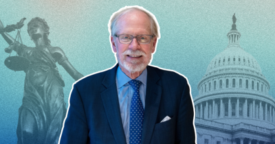 Stephen Heintz in a suit and tie stands in front of an illustrated background featuring the Statue of Justice and the U.S. Capitol building.