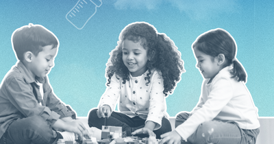 Three young children play together with building blocks, set against a blue sky background with illustrated child care icons.