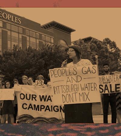 Our water campaign action with people holding signs