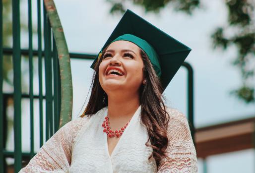 Smiling Latina graduate student