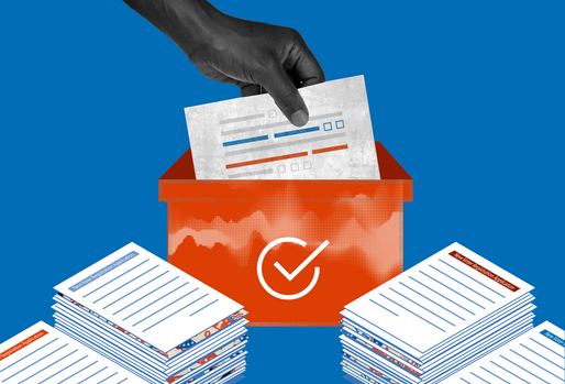 Image of a hand lowering a voter registration sheet into an orange box with stacks of voter registration papers on both sides